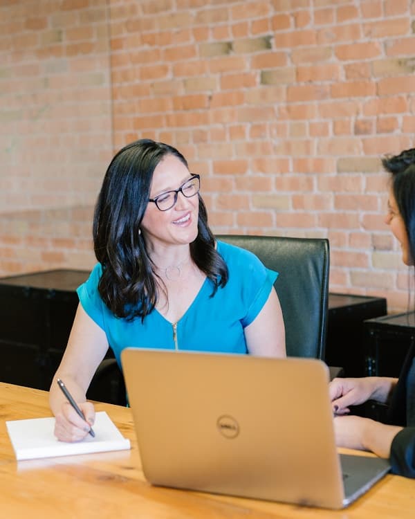 Professional woman working at laptop